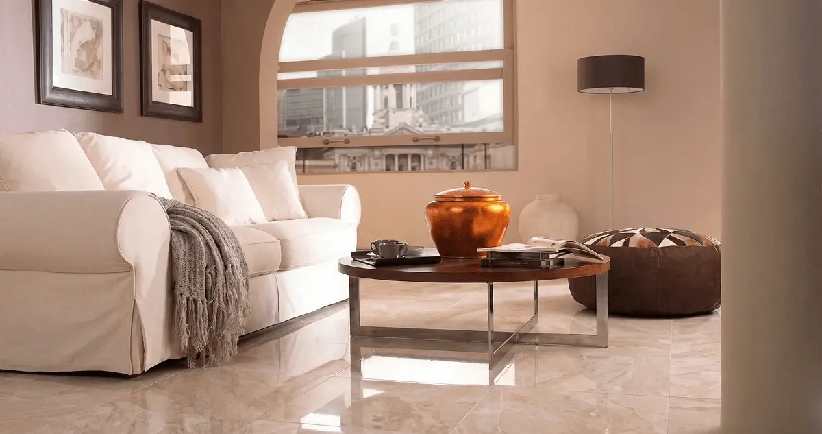 Modern living room with professionally installed marble flooring, a beige sofa, coffee table in Eugene, OR